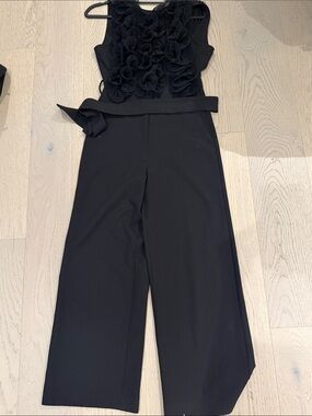 Elegant Black Sleeveless Wide-Leg Jumpsuit with Ruffle Bodice